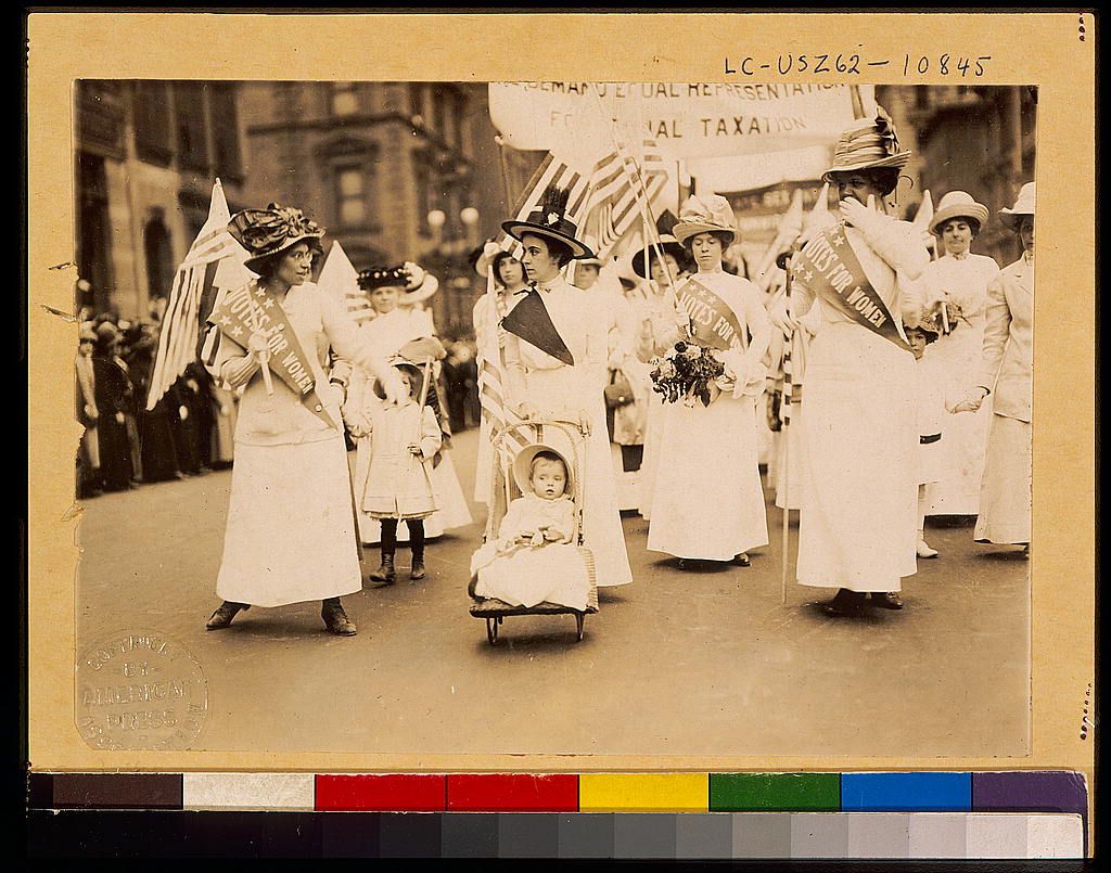 women lining up for parade