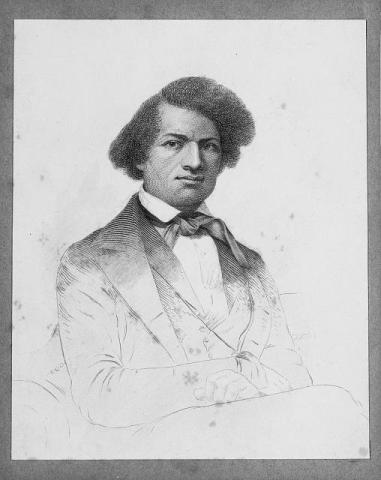 A young Frederick Douglass poses with a serious look and wearing a coat, vest, and tie.