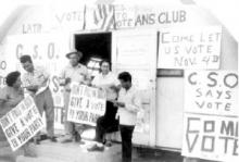 Chicano farmworkers with voting registration papers