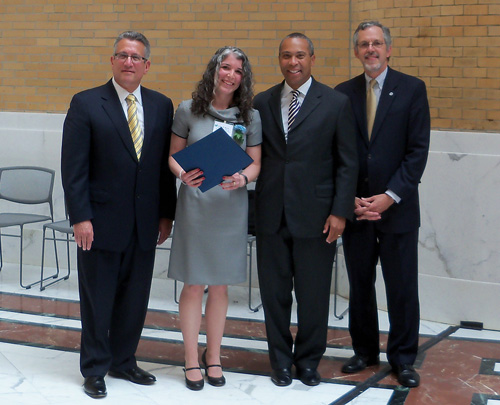 Easthampton High School teacher and Emerging America teacher-leader Kelley Brown receives History Teacher of the Year award from Governor Deval Patrick and Massachusetts Education Commissioner Mitchell Chester.