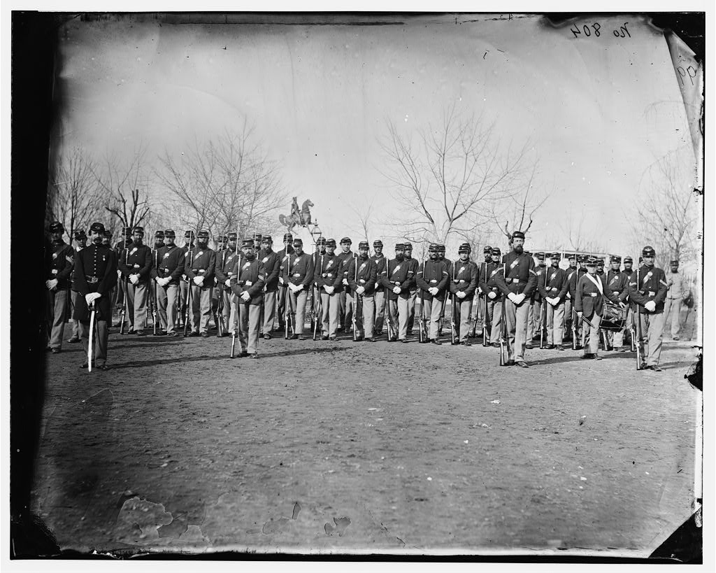 Washington, D.C. Company I, 10th Veteran Reserve Corps, at Washington Circle stands at attention.