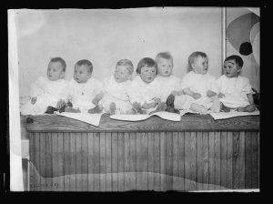 "Many nationalities. Here is a collection of future American citizens ready for the melting pot.” [1921]. Red Cross collection. 