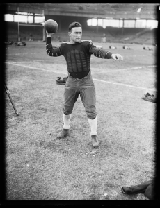 Picture of man throwing a football.