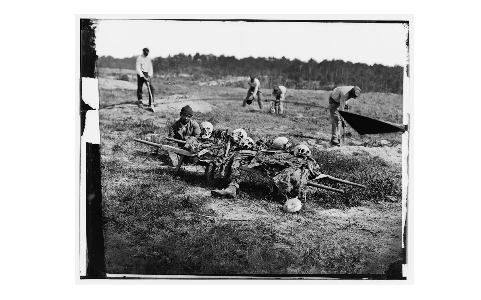African Americans collecting bones of soldiers killed in the battle