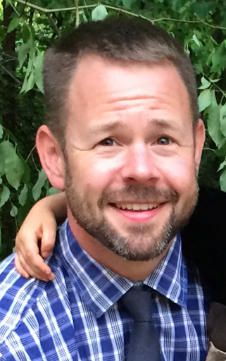 Head shot photo of Peter Vamosy.