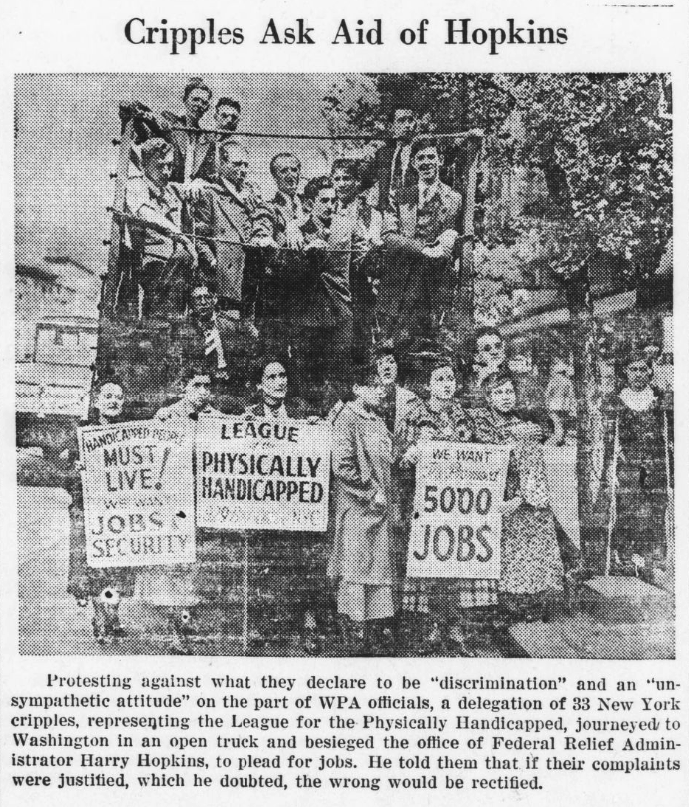 Several people pose with posters for the League of the Physically Handicapped, demanding WPA jobs. 