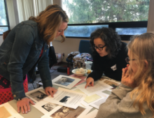 Teachers at an Accessing Inquiry course discussing primary sources